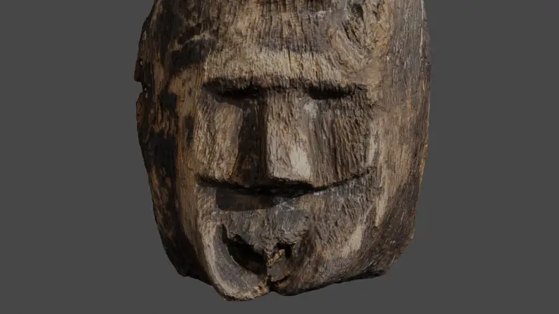 Водолазы исследовали озеро в Польше и случайно наткнулись на жуткое древнее лицо